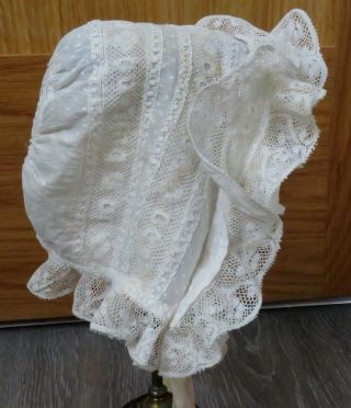 A Victorian Baby Bonnet With Valencienne Lace Trimming