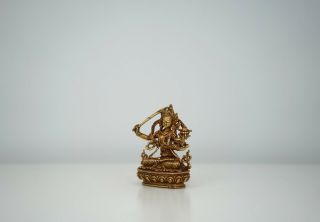 A Small Bronze Figure of Seated Manjusri 2