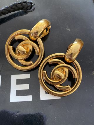 Rare Authentic Vintage Chanel Logo Dangle Earrings Turnlock 1997
