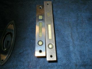 Two Antique Japanned Pocket door locks and one plate 2