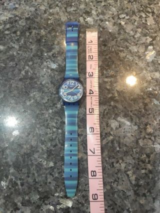 Vintage Swatch Watch With Multi Color Dial And Blue Band