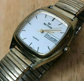 Vintage Waltham Men Gold Tone Barrel Analog Quartz Watch Hours Day Date Batt
