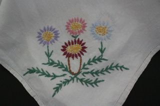 Vintage white table cloth with hand embroidered coloured flowers. 2