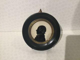 Antique Silhouette Portrait Of A Gentleman In A Round Frame.