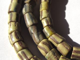 28 " Strand Of Rare Well Worn Small Striped African Trade Sand Cast Glass Beads