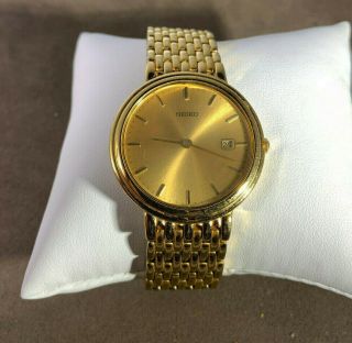 Seiko Gold Tone Calender Watch With Weave Band