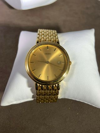 Seiko Gold tone Calender Watch with weave band 2