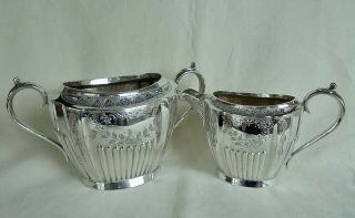 Silver Plated Milk Jug And Sugar Bowl With Fluted And Engraved Decoration