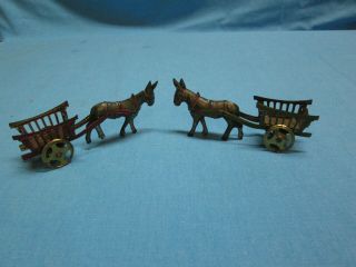 Two Antique Vintage Pre War Penny Toy Tin Donkey Carts One Red And One Green