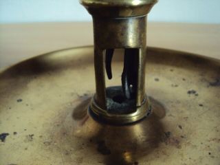 An Antique Brass Candlestick With Incomplete Mechanism To Push Out Candles 3