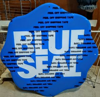Rare Blue Seal Feeds Die Cut Embossed Metal Sign.  Nos &