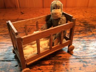 Antique Jointed Monkey In Old Wooden Crib On Wheels