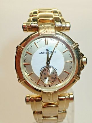 Anne Klein Gold - Tone And Silver Mother Of Pearl Dial Bracelet Watch