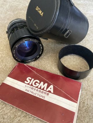 Sigma Lens For Canon 28 - 80mm f3.  5 - 4.  5 macro zoom.  With Case,  Book,  & Hood RARE 2