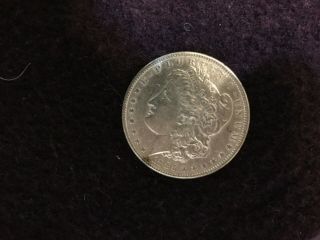 1883 P Morgan silver dollar uncertified 2