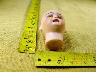 excavated small vintage painted bisque swivel doll head age 1890 German A 15374 2