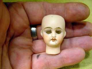 excavated small vintage painted bisque swivel doll head age 1890 German A 15374 3