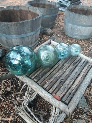 4 Various Sizes Of Vintage Japanese Glass Fish Net Floats