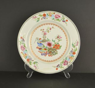 An 18th Century Chinese Famille Rose Porcelain Plate With Precious Objects