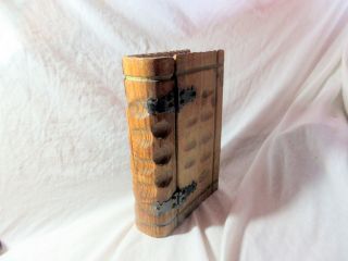 A Vintage Book Shaped Wooden Box