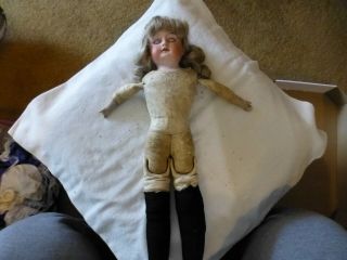 Antique Doll - Porcelain Head,  Shoulder Plate,  Leather Body,  Sawdust - Stuffed