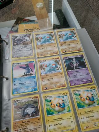 Binder of Various Pokemon Cards Including Mewtwo,  Moltres,  and Multiple Others 2