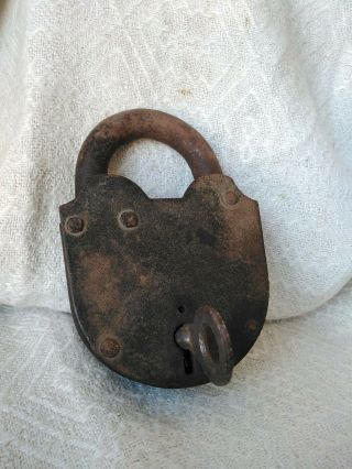 Old Antique Key In The Lock.  Made With Black Metal.  Lock And Key.