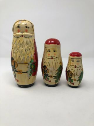 Vintage Christmas Wooden Painted Santa Claus Nesting Dolls Set Of 3