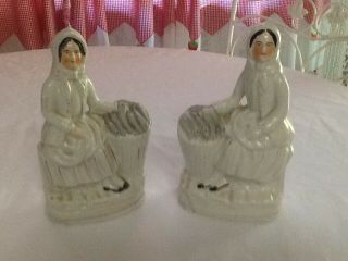 Staffordshire Pair,  Lady With Basket Of Fish.