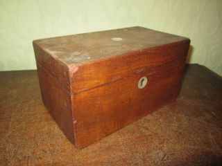 An Antique C19th Mahogany Tea Caddy With Mother Of Pearl Escutcheon