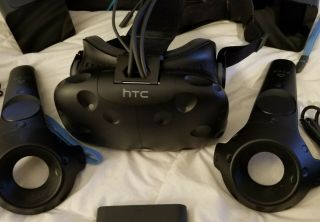 HTC Vive VR System Complete,  2 controls and all components.  Rarely 2
