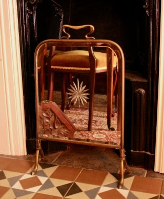 A Smart C19th Nouveau Mirror Backed Fire Screen With Starburst Design
