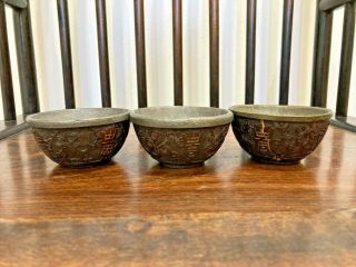 Set of three old Chinese pewter lined coconut shell cups 2