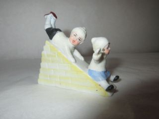 Antique German Bisque Snowbaby Figurine - Boy & Girl Sliding Down Hill