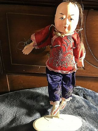 Antique Chinese Composition Doll In Embroidered Silk Clothing.