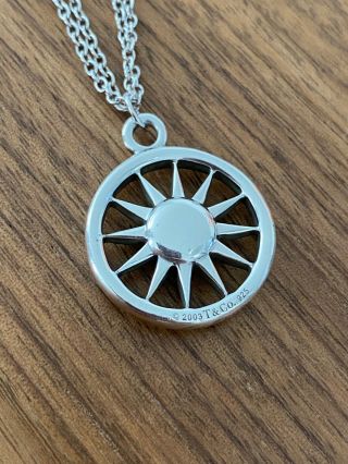 Tiffany & Co.  Sterling Silver Sun Pendant with 16 