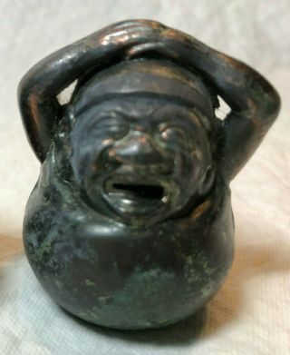 Antique Crane & Breed Manufacturing Woeful Fat Man Paperweight