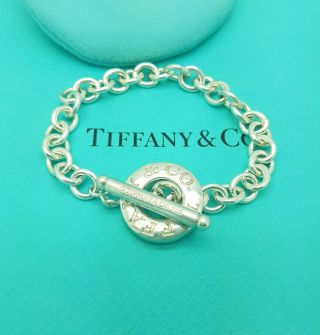 Tiffany & Co.  Rare Toggle Logo Charm 7.  5 Inches Sterling Silver Bracelet