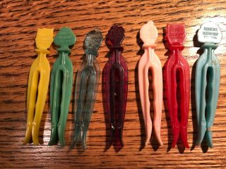 7 Plastic Bakelite Clothes Pins Featuring Cats Dogs Humans Colorful