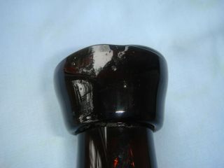 antique blown glass bottle amber in color 3