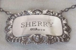A Fine Vintage Solid Sterling Silver Sherry Decanter Label Shell Embossed 1989.