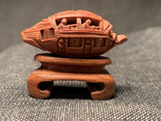 Vintage Chinese Nut Carving Of A Junk Boat Mounted On Hardwood Stand