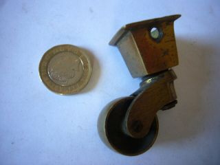 Set of 4 matching small brass castors for a piece of antique/vintage furniture 3