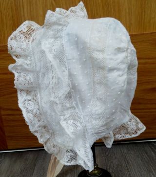 A Victorian Baby Bonnet With Valencienne Lace