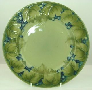 A Rare William Moorcroft Celadon Green Leaf & Berry Display Plate.