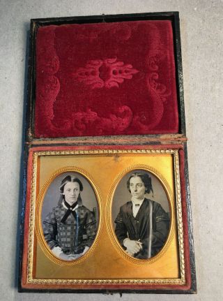 A Two Extremely Sharp Daguerreotypes In A Very Rare Double Oval Mat.