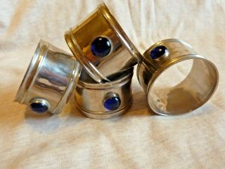 A Set Of Four Vintage Silver Plated Arts And Crafts Napkin Rings