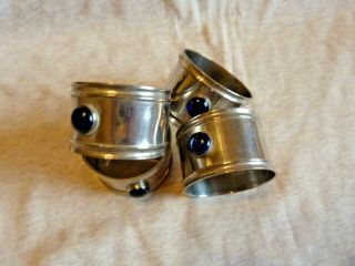 A set of four vintage Silver Plated Arts And Crafts Napkin Rings 2