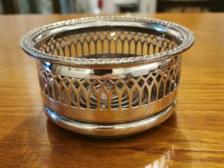 Vintage,  Cavalier,  Silver Plated Wine Bottle Coaster With Wood Base.
