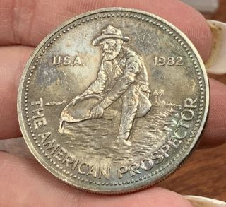 1982 Rare Silver 1 Troy Oz American Prospector Round.  999 Fine Silver Toning